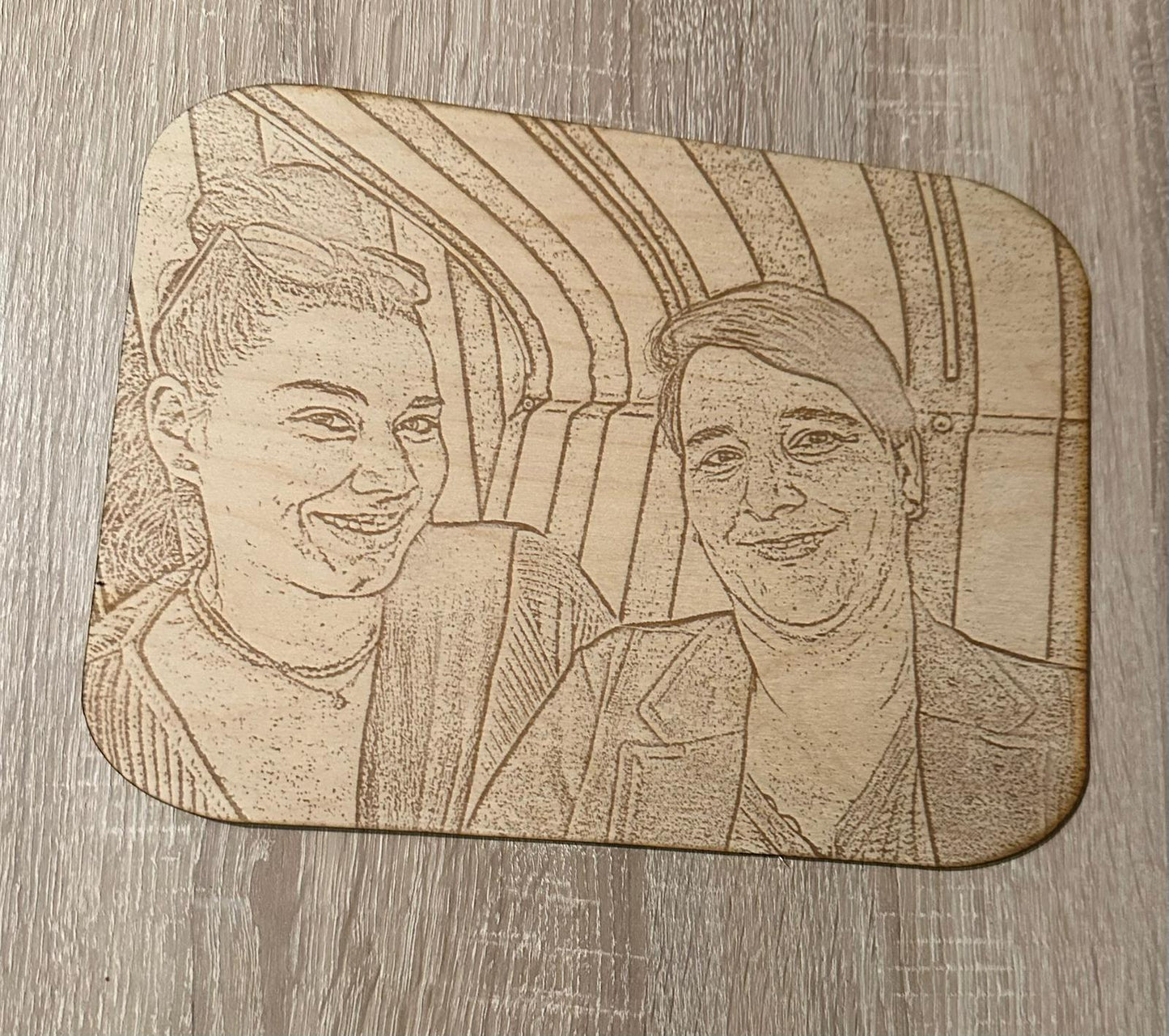 Ihre Erinnerungen in Holz graviert